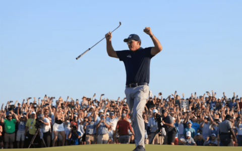 Cover Image of Phil Michelson with hands raised
